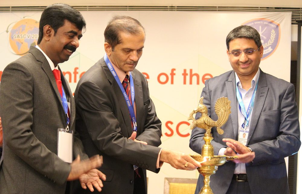 Lighting of the lamp by Professor Bimal N. Patel, Director General, Raksha Shakti University